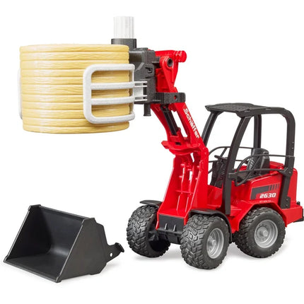 Schaeffer Compact loader with Bale Gripper and Bale